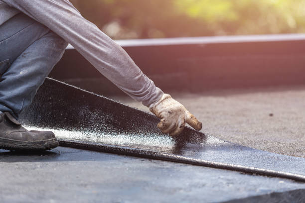 Professional Basement Waterproofing technician working in Glen Burnie, MD